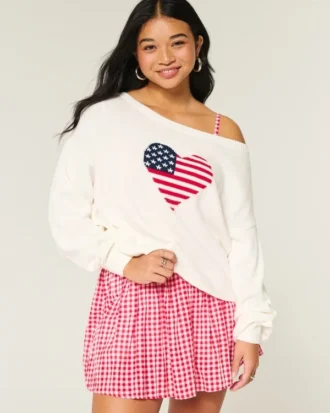 Slouchy off-shoulder trui met hartjesprint