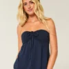 Strapless babydoll top met tailleband