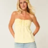 Strapless babydoll top met tailleband