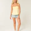 Strapless babydoll top met tailleband