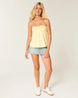 Strapless babydoll top met tailleband