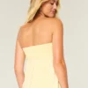 Strapless babydoll top met tailleband