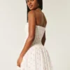 Strapless mini-jurk met gesmokt lijfje Strapless mini-jurk met gesmokt lijfje