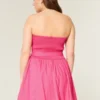 Strapless mini-jurk met strik Strapless mini-jurk met strik