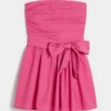 Strapless mini-jurk met strik Strapless mini-jurk met strik