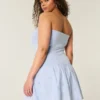 Strapless mini-jurk met verlaagde taille en gebreide stof Strapless mini-jurk met verlaagde taille en gebreide stof