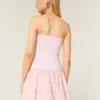 Strapless mini-jurk met verlaagde taille en gebreide stof