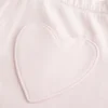 Sweatpants met hartvormig zakje en wijde pijpen Sweatpants met hartvormig zakje en wijde pijpen