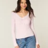 Top met lange mouwen en kanten rand Top met lange mouwen en kanten rand