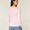 Top met lange mouwen en kanten rand Top met lange mouwen en kanten rand