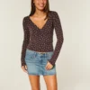 Top met lange mouwen en V-hals Top met lange mouwen en V-hals
