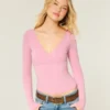 Top met lange mouwen en V-hals Top met lange mouwen en V-hals