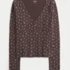 Top met lange mouwen en V-hals Top met lange mouwen en V-hals