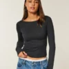 Top met lange mouwen, naadloze stof en V-hals Top met lange mouwen, naadloze stof en V-hals