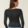 Top met lange mouwen, naadloze stof en V-hals Top met lange mouwen, naadloze stof en V-hals