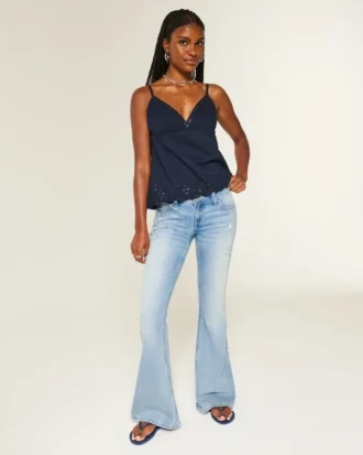 Ultra laag getailleerde distressed lichtgewassen flare jeans met pailletten