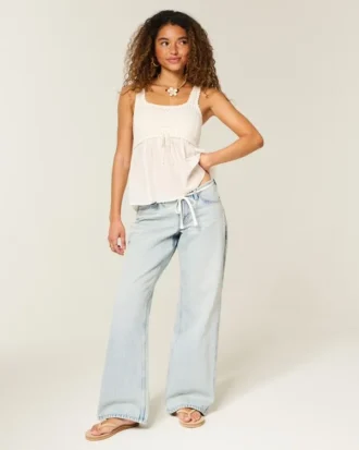 Ultra laag model, licht gewassen, mini-tailleband, baggy jeans met vetersluiting
