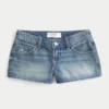 Ultra laag model, medium wash, mini-short van denim met bloemenborduursel Ultra laag model, medium wash, mini-short van denim met bloemenborduursel