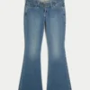Ultra laag uitgesneden donkerblauwe flare jeans met riem Ultra laag uitgesneden donkerblauwe flare jeans met riem