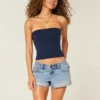 Ultra laag uitgesneden mini-short van geborduurd denim Ultra laag uitgesneden mini-short van geborduurd denim