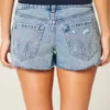 Ultra laag uitgesneden mini-short van geborduurd denim Ultra laag uitgesneden mini-short van geborduurd denim