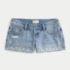 Ultra laag uitgesneden mini-short van geborduurd denim Ultra laag uitgesneden mini-short van geborduurd denim
