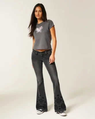 Ultra laag uitgesneden zwarte flare jeans met geborduurde bloemenprint