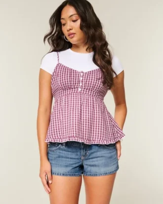 Ultra lage taille distressed medium wash denim minishort