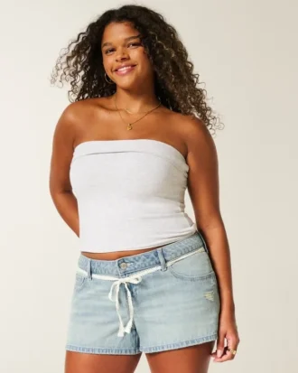 Ultra lage taille, licht gewassen denim minishort met kanten strik