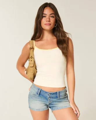 Ultra lage taille Medium wash denim korte broek