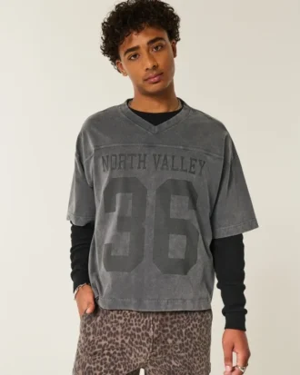 Zwaar baggy cropped varsity T-shirt met voetbalprint
