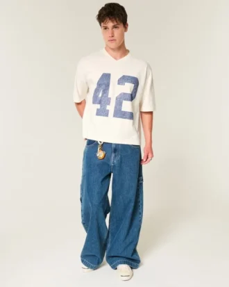 Zwaar baggy cropped varsity T-shirt met voetbalprint