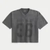 Zwaar baggy cropped varsity T-shirt met voetbalprint Zwaar baggy cropped varsity T-shirt met voetbalprint